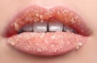 Macro close-up of pink lips coated in sugar